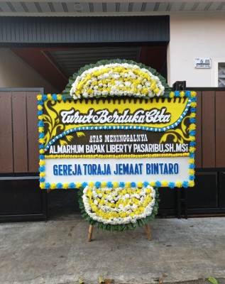 Papan Bunga Duka di Rimba Sekampung